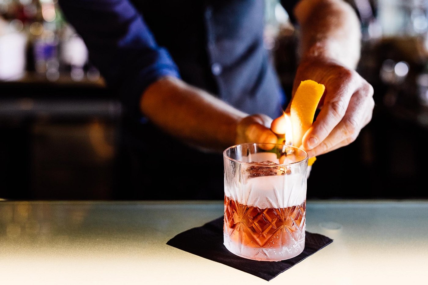 Bartender with a cocktail